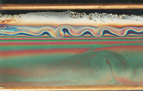 Images of evaporatively-driven convection in a draining soap film.