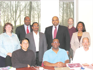 The APS Committee on Minorities met at APS headquarters in College Park, MD on April 7. In the photo are (left to right): Juana Rudati, Eric Lin, Lawrence Norris (National Society of Black Physicists liaison), Calvin Howell (COM Chair), Edward Thomas (bottom), Jay Dickerson (top), APS Director of Education Ted Hodapp, APS Outreach Programs Administrator Arlene Modeste Knowles, and Pete Markowitz.