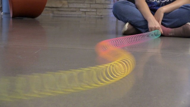 Students making waves with a Slinky