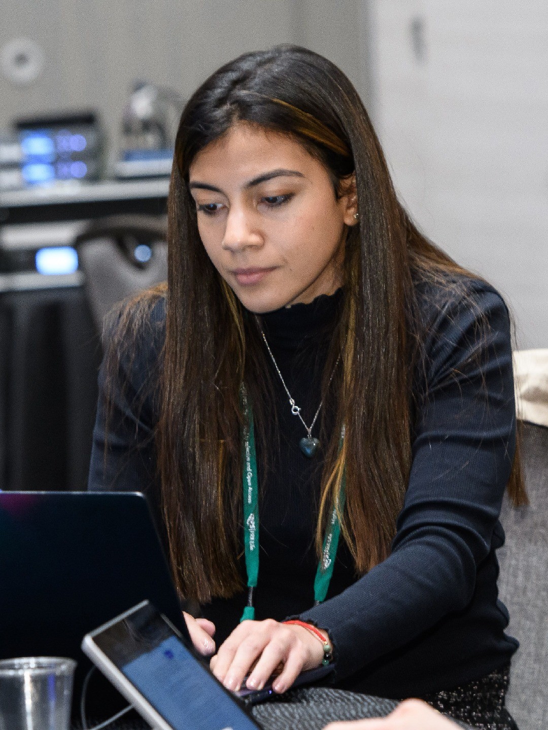 Woman typing on her laptop