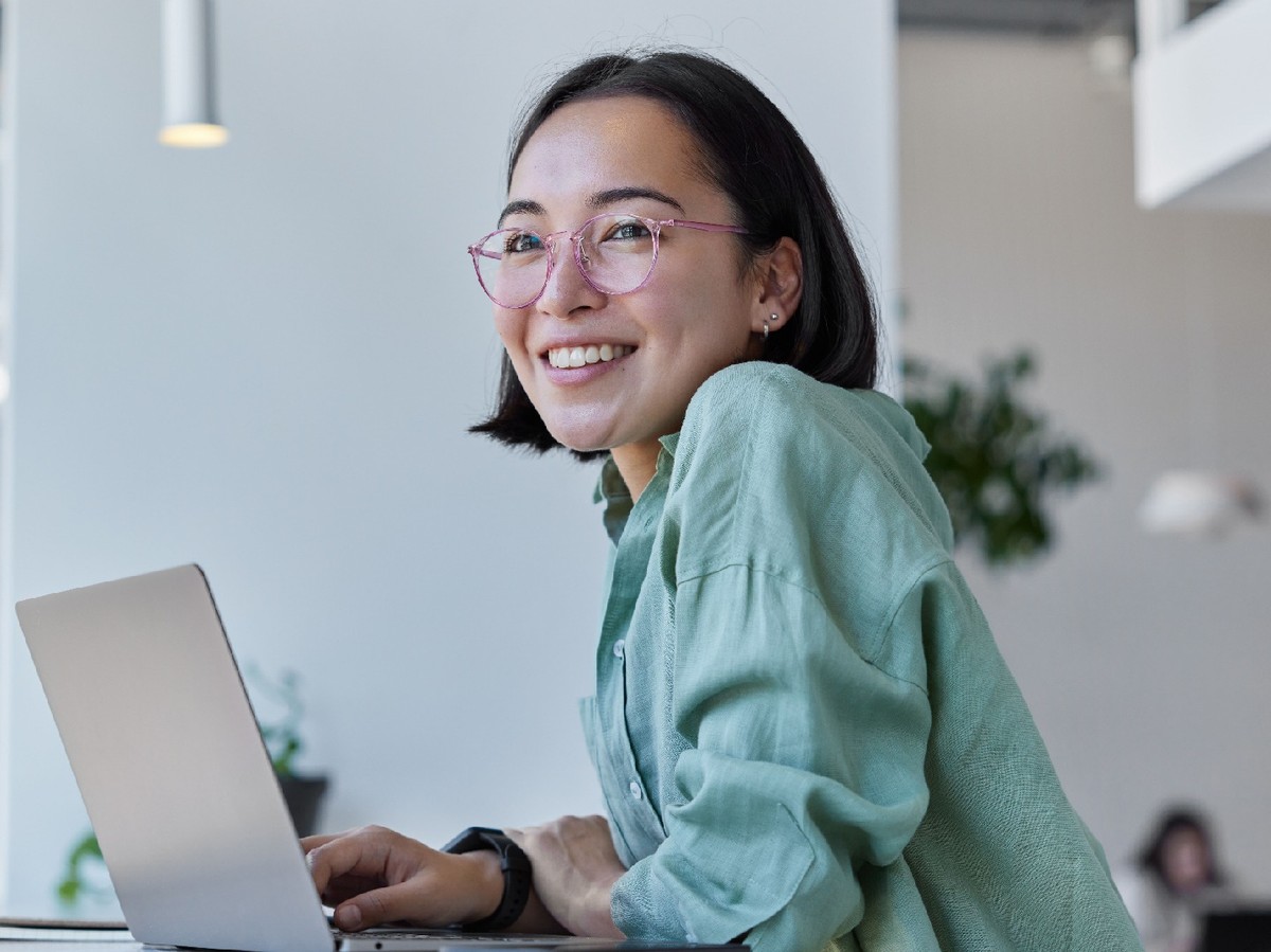 A woman at a laptop