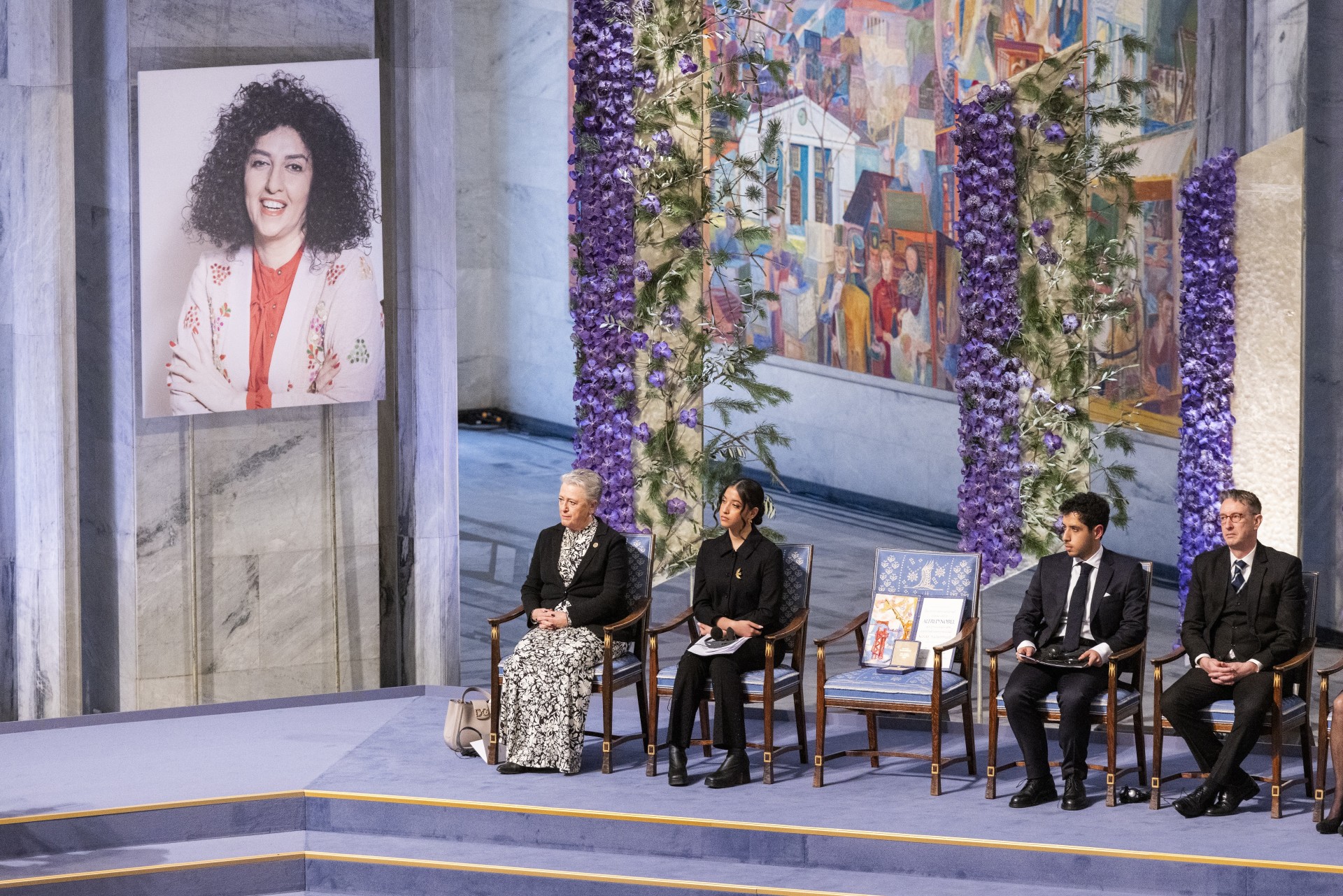 Mohammadi’s children accept the 2023 Nobel Peace Prize on her behalf in Oslo.