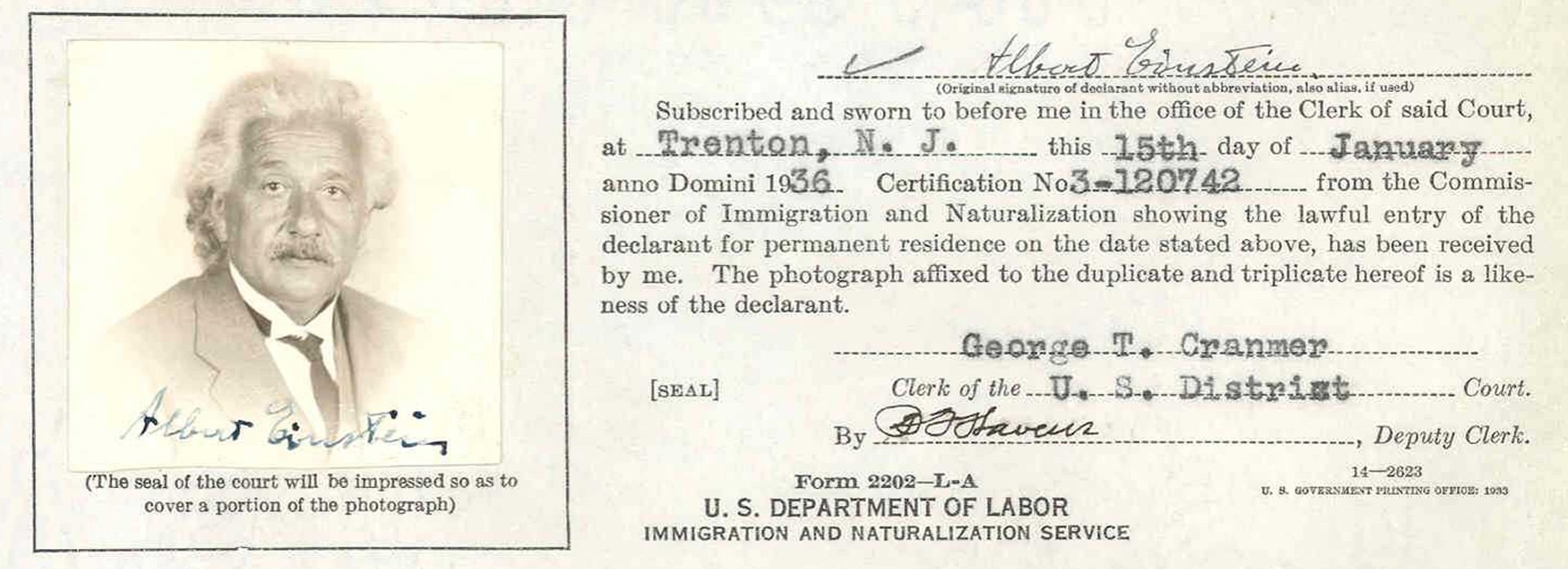  A black-and-white document that includes a portrait photograph of Einstein, alongside official text and signatures from 1936.