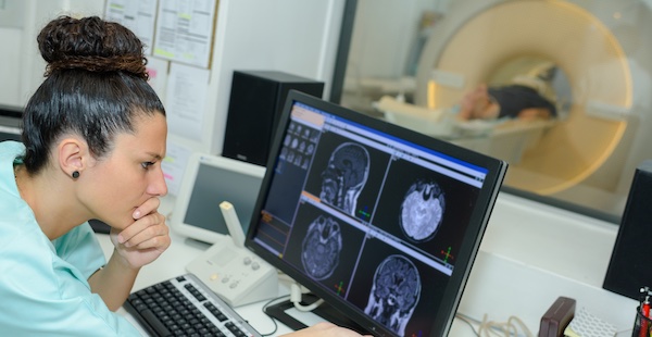 Woman reading CT scan results