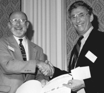 Andrew Sessler (left) being presented the APS Wilson prize by John Peoples. 