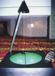 The 'crazy' (chaotic) pendulum encourages visitors to pull the pendulum bob and try and predict the unpredictable.