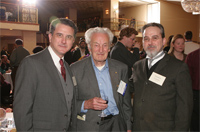 Even chemists celebrate the World Year of Physics. Distinguished research chemist Leland Burger (center), who worked on the Manhattan Project, recalls those exciting times with 'Enrico Fermi' (left). Listening in is 'H. A. Lorentz' (right).