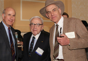 'J. Robert Oppenheimer' (right) can’t fool William T. Golden (center), treasurer emeritus of AAAS, adviser to Presidents, and pre-eminent philanthropist of science. He knew the REAL Robert Oppenheimer. Shown with Golden and 'Oppie' at left is Gilbert S. Omenn, the incoming President of AAAS