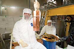 Researchers at Cold Dark Matter Search (CDMS) search for dark matter candidates.
