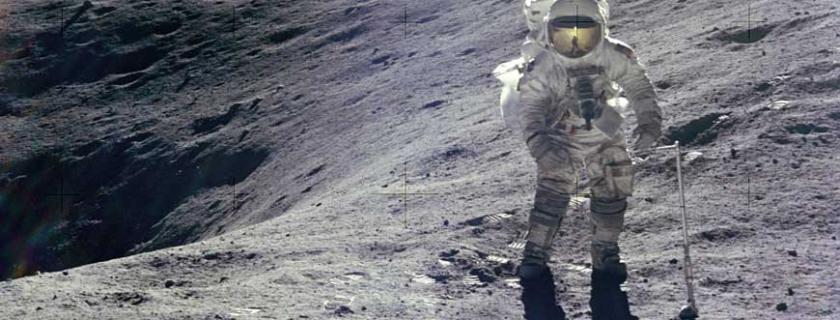 Astronaut Alan Shepard playing golf on moon slide